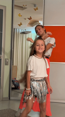 Family dance session and pet bonding captured in Krasnoyarsk
