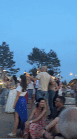 Live outdoor concert at dusk in Saint-Galmier, France
