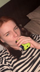 Woman vaping indoors captured in Saint Petersburg evening