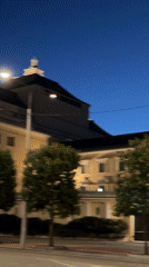 Tallinn at dusk: classical architecture and a parrot promo truck