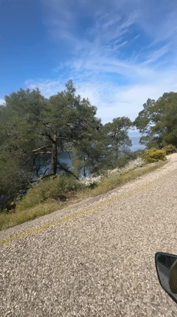 Motorcyclist captures scenic waterfront view in Fethiye, Turkey
