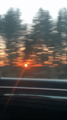 Sunset captured from moving vehicle in Buranovo, Russia