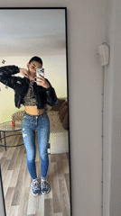 Woman Takes Mirror Selfies in Gabrovo Indoor Location