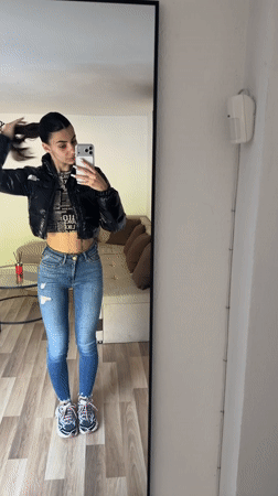 Woman Takes Mirror Selfies in Gabrovo Indoor Location