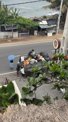 Sanitation crew conducts early morning waste collection in Ahangama
