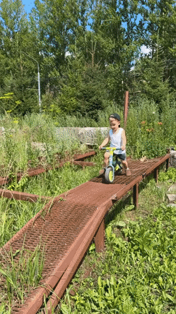 Summer morning out in Rusanovo, puddles and balance bikes