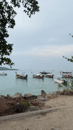 Early morning waterfront activity documented in Rawai, Thailand