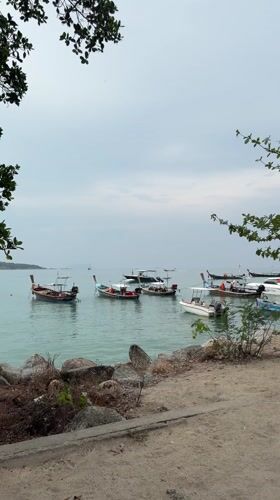 Early morning waterfront activity documented in Rawai, Thailand