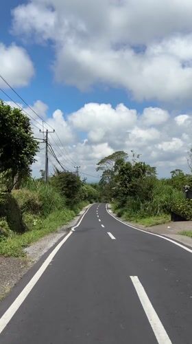 Morning road travel documented in rural Kintamani, Indonesia