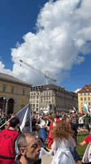 Folk dancers gather in Munich town square Sunday morning