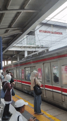 Klender Station area buzzing with commuters and street market activity