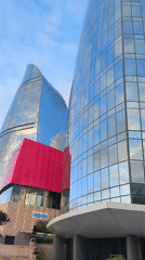 Walking tour documents Baku landmarks and architecture during afternoon