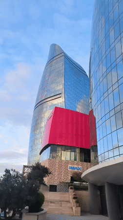 Walking tour documents Baku landmarks and architecture during afternoon
