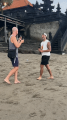 Beach visitors document ordinary morning moments in North Kuta