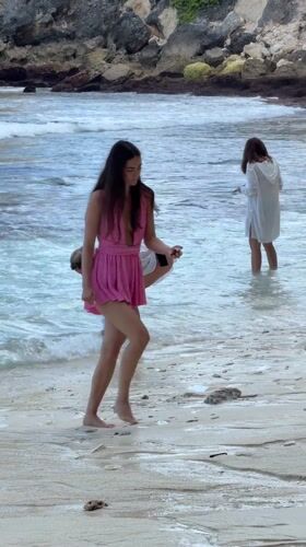 Women explore beaches and coastal cliffs in Indonesia morning