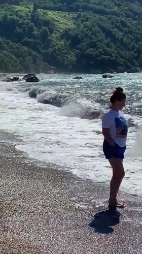 Morning beach time in Prijevor with waves and pebbles