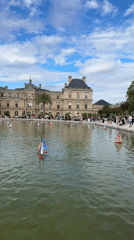 Lazy afternoon at Luxembourg Gardens, toy boats on the pond