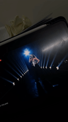 Tablet displays Poland's 2024 Eurovision performance with female singer