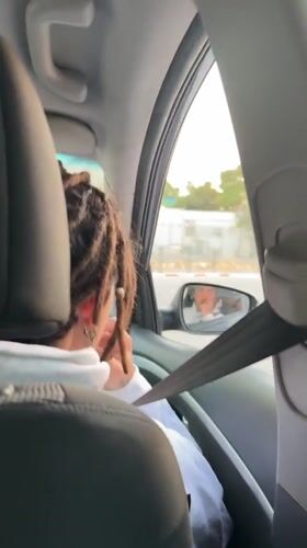 Car passengers recorded during daytime drive in Mitzpe Ramon