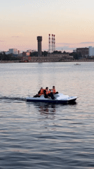 Evening leisure activities documented at Izhevsk Pond waterfront