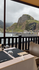Oceanfront dining experience documented in Machico, Portugal restaurant
