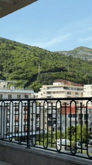 Tourist documents afternoon scenes around Budva, Montenegro