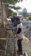 Construction, chrysanthemums, and large-scale cooking in Batu