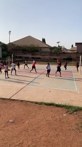 Youth play volleyball, basketball on outdoor courts in Nigeria