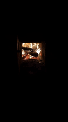 Wood-burning stove operates in Emel'yanovo, Russia