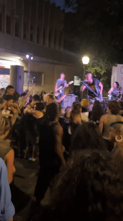 Live band lights up the night with a dancing crowd