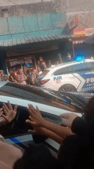 Elaborate street parade winds through Cianjur with floats and traditional fanfare