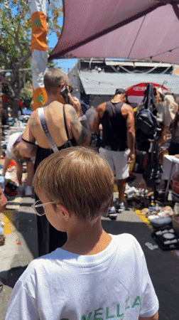 Morning scene at a Tel Aviv outdoor market and shopping street