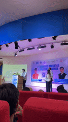 Indoor conference talk underway in Dehradun, India