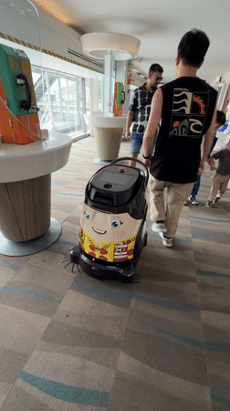 Robot vacuum, tourist selfies observed at Thailand airport terminal