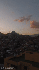 Family playtime and evening scenes documented across Caracas neighborhoods