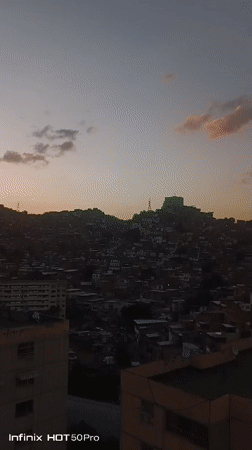 Family playtime and evening scenes documented across Caracas neighborhoods