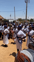 Uniformed women with swords perform formation in Bukuru