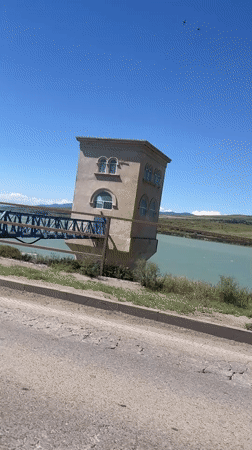 Turquoise river and arched building captured in Tbilisi footage