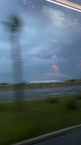 Vehicle passengers record overcast coastal drive near Manavgat, Turkey
