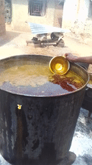 Traditional outdoor cooking with makeshift stoves observed