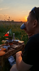 Hand-roasting and brewing coffee outdoors in rural Moldova