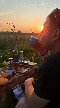 Hand-roasting and brewing coffee outdoors in rural Moldova