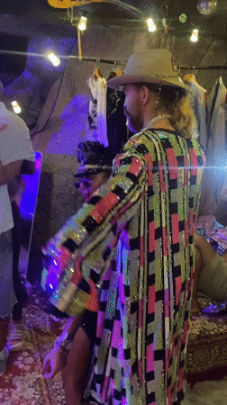 Casual indoor party with dancing captured in Ko Samui