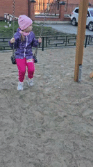 Children play at Tobolsk park playground with swings, scooters
