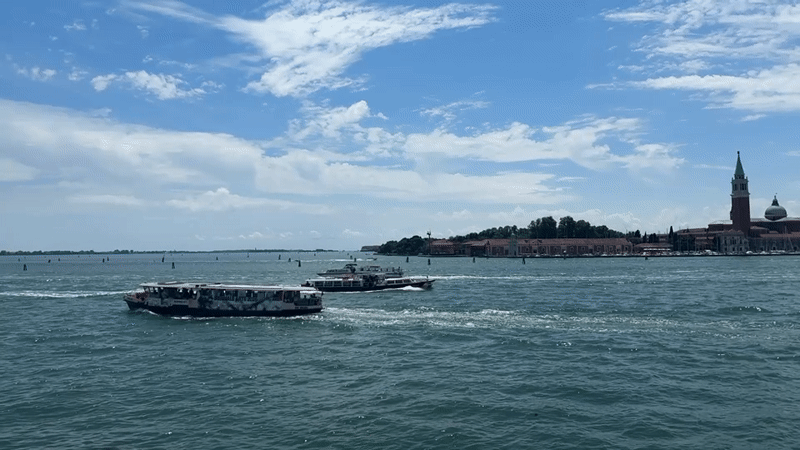 Venice water traffic observed during midday boat transit