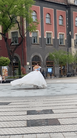 Newlyweds dance in historic Subotica square amid Art Nouveau architecture
