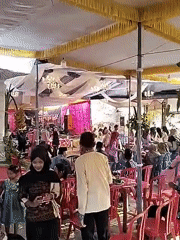 Traditional wedding reception underway in Jetis, Indonesia