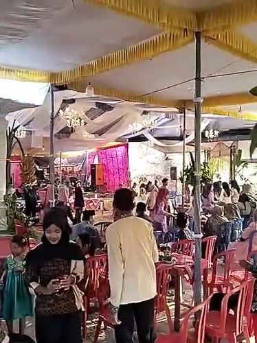 Traditional wedding reception underway in Jetis, Indonesia