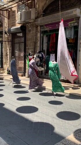 Street life and landmarks across Tel Aviv on a sunny morning