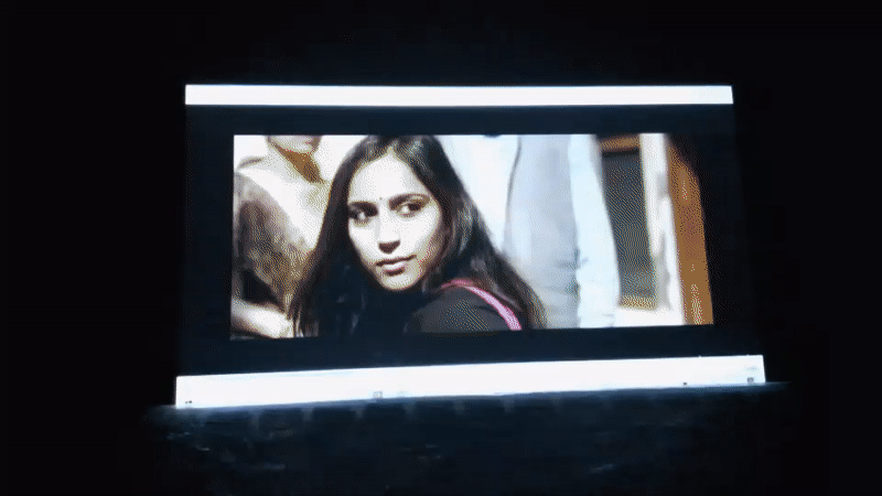 Assorted video content playing on screens in Azume, Nigeria
